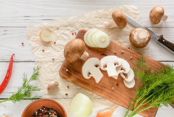 broken half pita bread caucasian, lying on a cutting board. Light wood background.