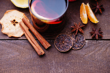 Hot mulled wine with spices, dried apple and mandarine 