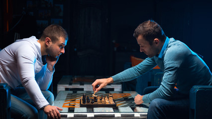 Young people playing chess