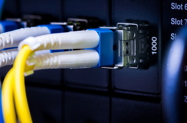 fiber Network Server, shot of network cables and hub in a technology data center.network cables...