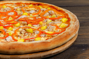 Delicious italian pizza served on wooden table