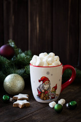 Christmas or New Year composition with cocoa, marshmallows, cookies and christmas decorations