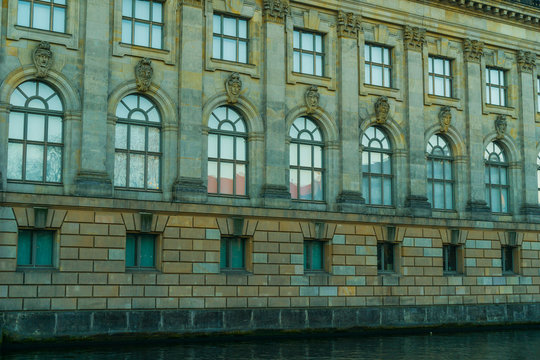 bode museum with stone facade and spree river on the ground