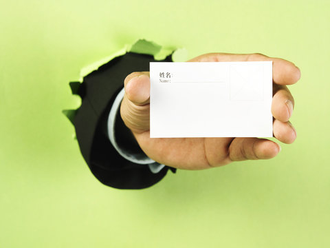 Hand Holding A Namecard