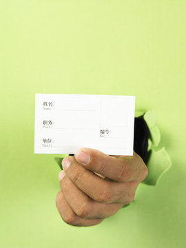 Hand Holding A Namecard