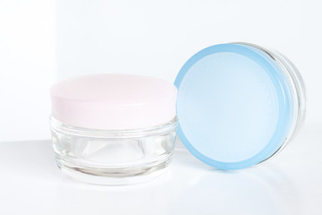 Cosmetic glass jars for day and night face and skin care cream
