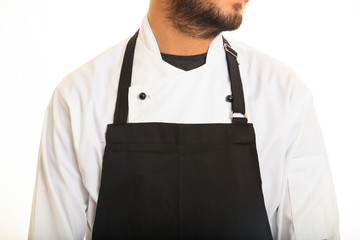 Chef with black apron