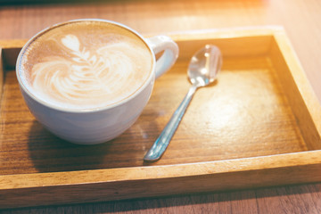 Hot latte coffee in vintage tone