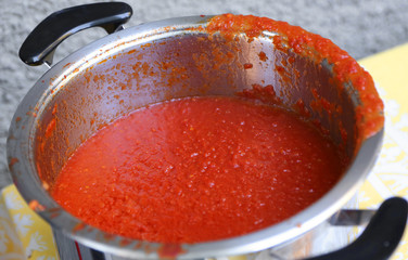 pot with red tomato sauce homemade