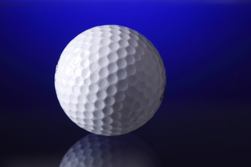 Golf Ball on blue Background