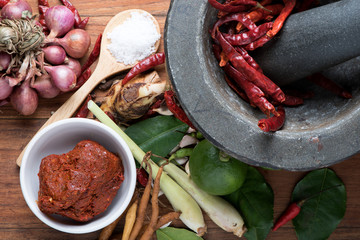 spices with ingredients on dark background. asian food, healthy or cooking concept.