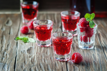 Red cocktail with raspberry and mint