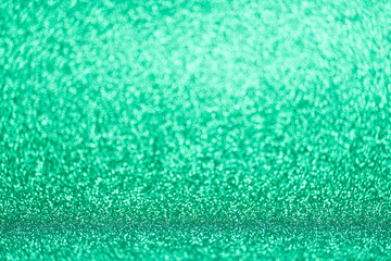 Obraz premium Defocused green glitter background