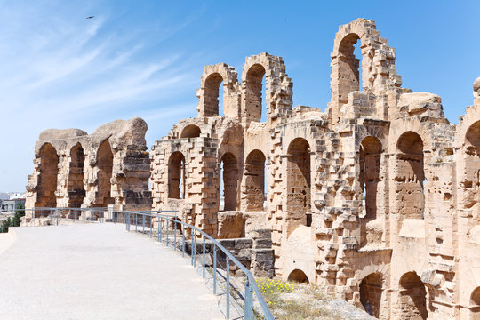 Demolished ancient walls and arches in Tunisian Amphitheatre in El Djem, Tunisia