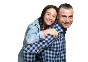 Obraz premium Father standing and carrying girl on his back