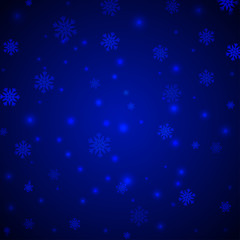 Fototapeta na wymiar Christmas blue background with snowflakes and glitter