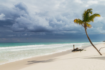 Fototapeta na wymiar Beautiful beach. Storm sky over the sea Tulum, Mexico, Carribean