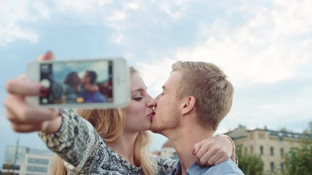 Young couple taking a selfie