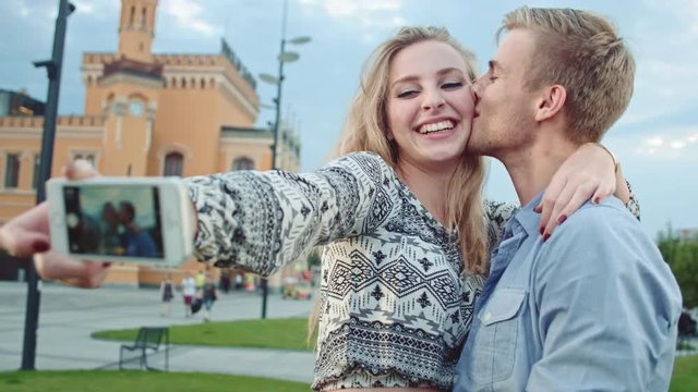 Young couple taking a selfie
