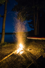 camp fire sparks in the night, North Europe