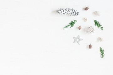 Christmas composition. Christmas decoration, cypress branches, pine cones. Flat lay, top view