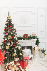 Fototapeta na wymiar Christmas scene with tree gifts in background