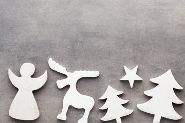 Christmas background. White tree decorations on a gray backgroun