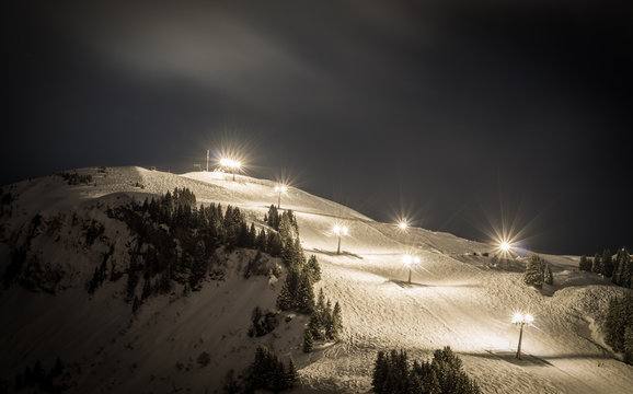 Ski slope with lights at night