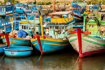 Fototapeta na wymiar Fishing boats in a harbor