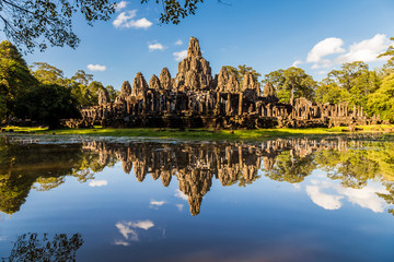 Angkor wat temple reflecting in a lake