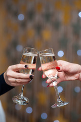 Celebration. People holding glasses of champagne making a toast