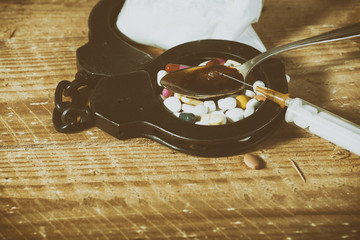 Drug syringe and cooked heroin