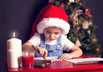 Christmas boy writing letter to Santa