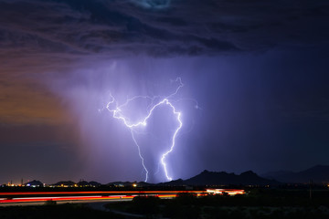 Obraz na płótnie Canvas Lightning in a storm over Tucson