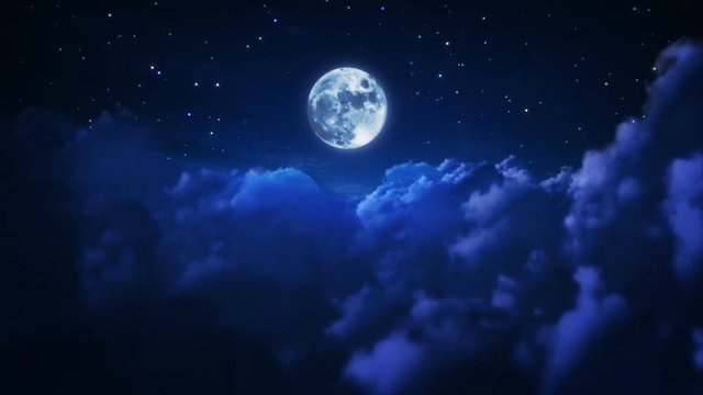 Flying through a cloudy sky at night with full moon. Blue. Loopable.
