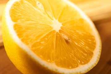 yellow lemon on a wooden table