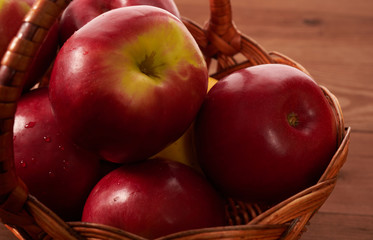 red apples on a wooden table