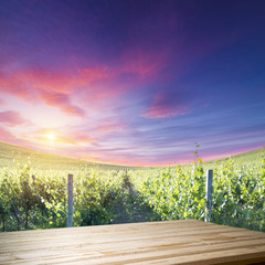 Fototapeta premium Red wine with barrel on vineyard in green Tuscany, Italy