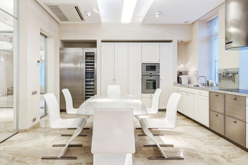 Fototapeta na wymiar White luxury kitchen
