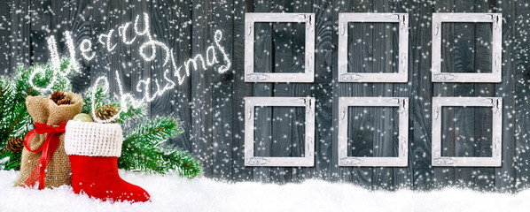 Santa boot and bag on wooden wall background with photo frame