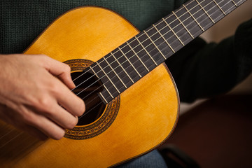 Fototapeta premium Man playing a guitar