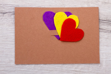 Mockup of greeting card. Hearts on top of card . Examples of paper congratulations. Send love and greetings.