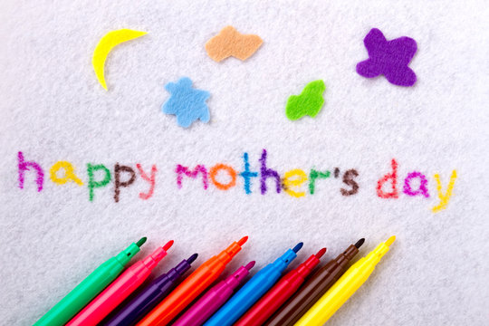 Happy Mother`s Day text. Inscription and felt-tip pens. Develop your imagination. Handmade for moms from kids.