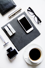 smartphone, electronic cigarette and men's accessories top view