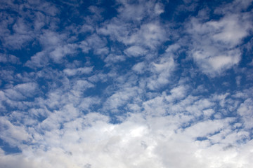 White clouds in a blue sky landscape