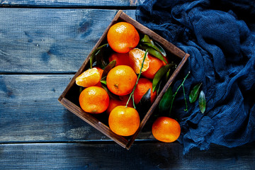 Fototapeta na wymiar Box of juicy tangerines