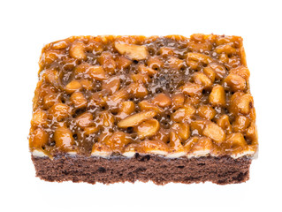 Cashew nut with caramel cake on coffee cake.