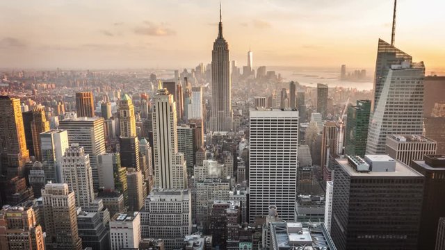 Aerial view of Manhattan skyline. From day to night. Timelapse.