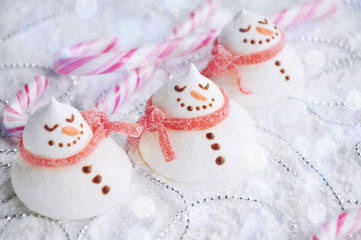 Funny meringue snowman - Christmas decoration, creative food idea for kids party, bokeh background