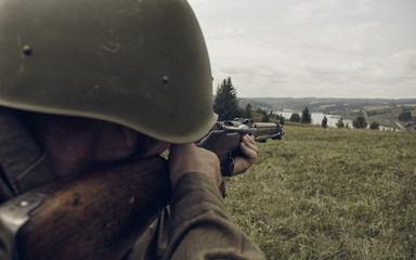PERM, RUSSIA - JULY 30, 2016: Historical reenactment of World War II, summer, 1942. Soviet soldier...